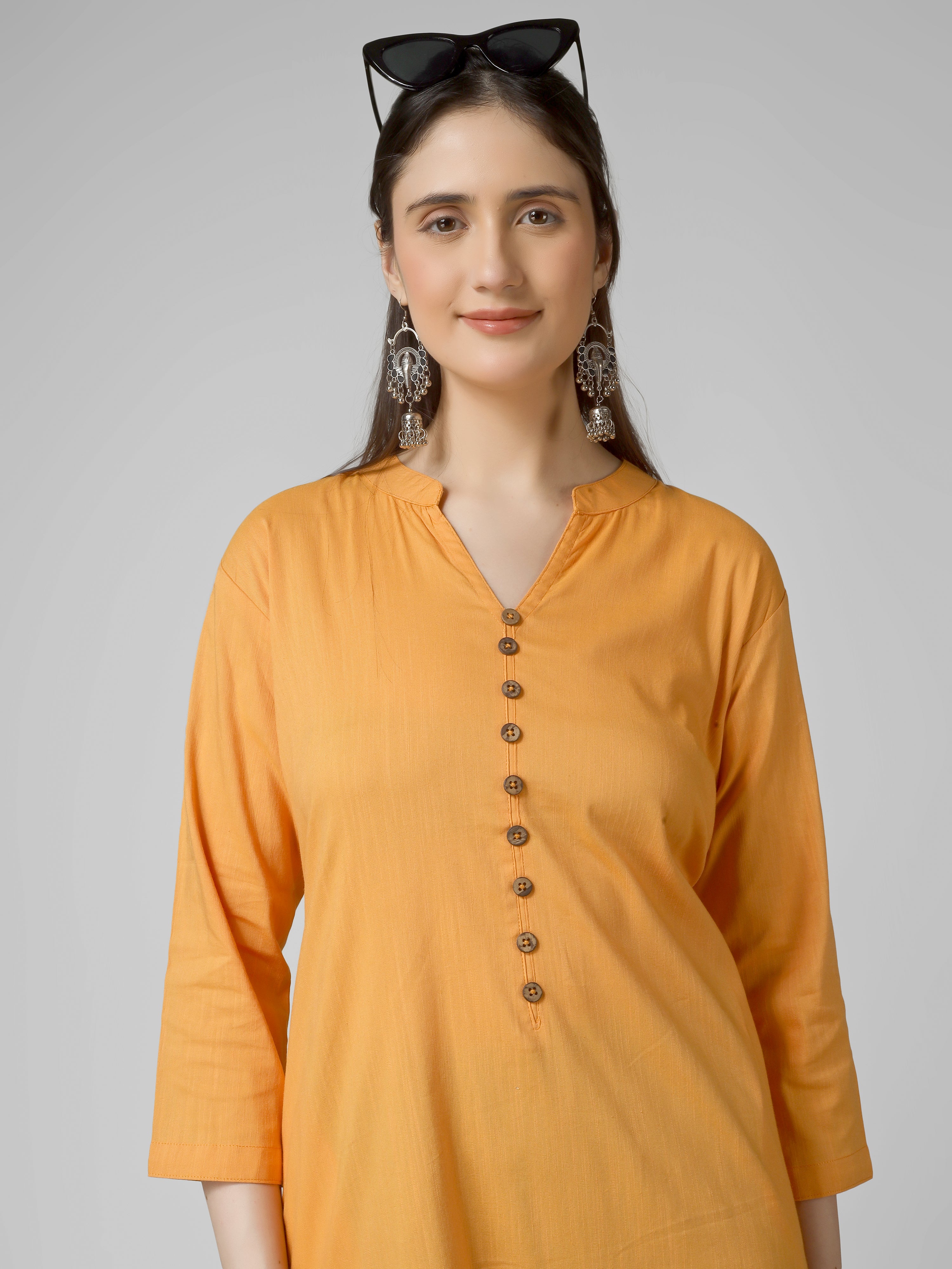 Saffron Solace: Mustard Yellow Solid Cotton Kurti with Wooden Button Detail
