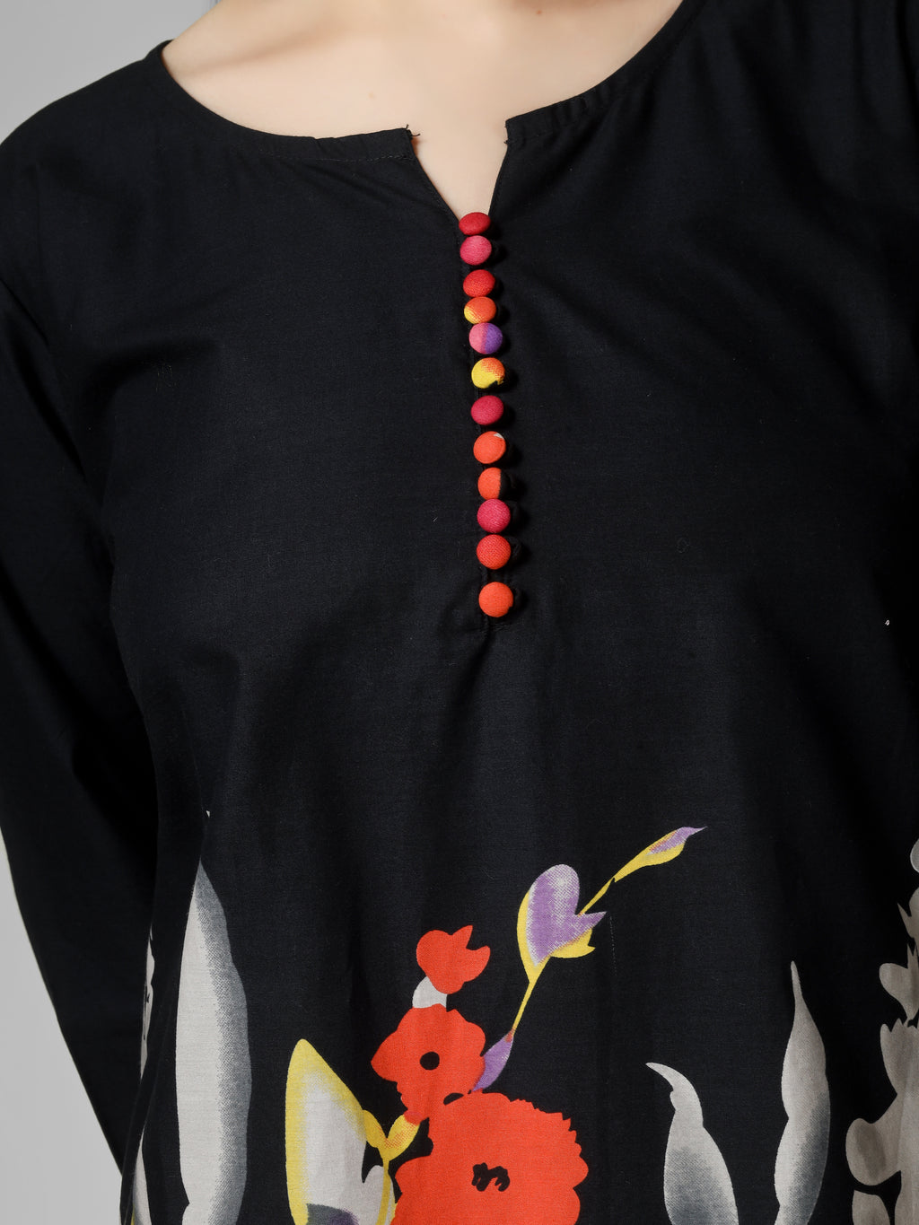 Midnight Bloom: Black Cotton Kurti with Vibrant Floral Hem and Potli Button Detail