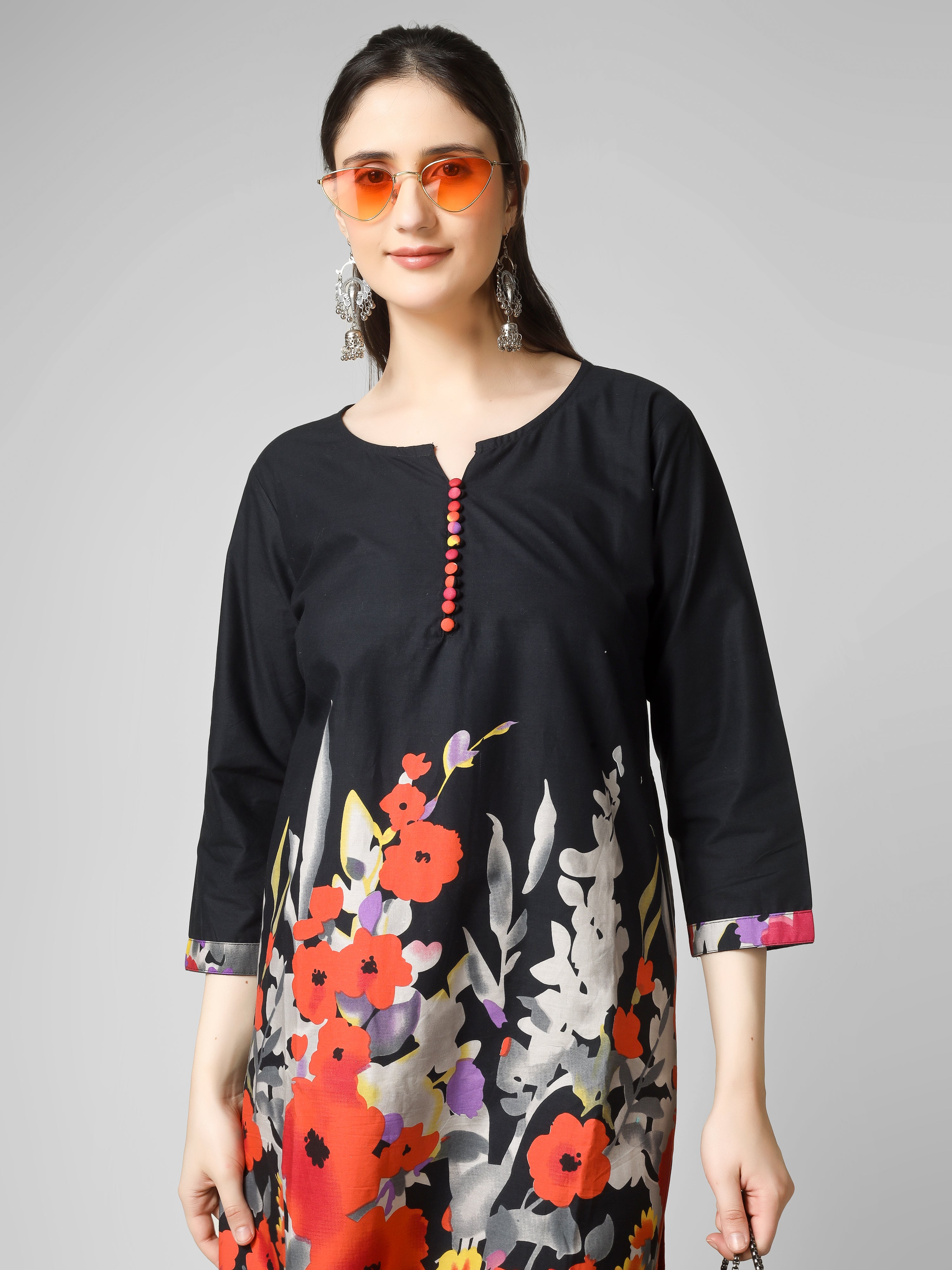 Midnight Bloom: Black Cotton Kurti with Vibrant Floral Hem and Potli Button Detail