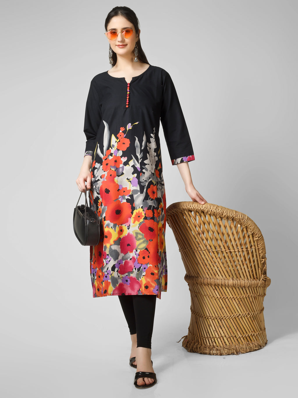 Midnight Bloom: Black Cotton Kurti with Vibrant Floral Hem and Potli Button Detail